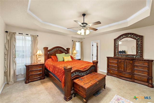 2006 Jesse Dr, Copperas Cove, TX 76522 - bedroom with ceiling fan, crown molding, a raised ceiling, baseboards, and light carpet