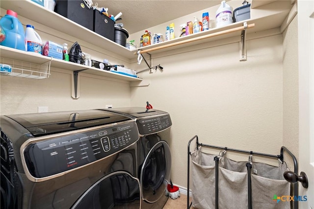 2006 Jesse Dr, Copperas Cove, TX 76522 - laundry area featuring washer and dryer, laundry area, and baseboards