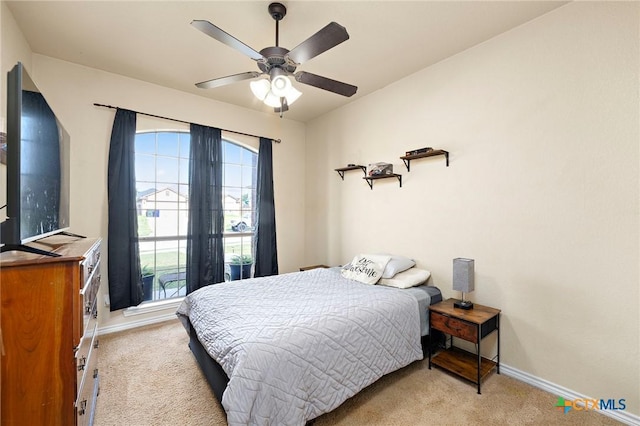 2006 Jesse Dr, Copperas Cove, TX 76522 - bedroom with baseboards, light carpet, and ceiling fan