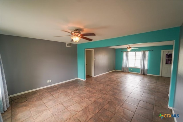 103 Royal Dr, Victoria, TX 77901 - unfurnished room featuring a ceiling fan and baseboards