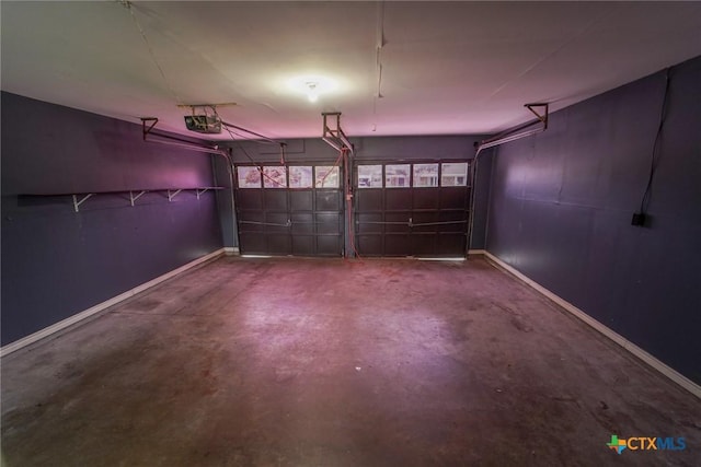 103 Royal Dr, Victoria, TX 77901 - garage featuring baseboards