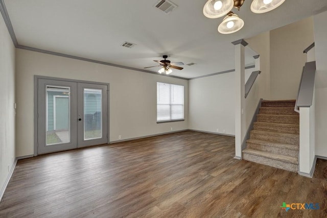 unfurnished living room featuring wood-type flooring, ceiling fan, crown molding, and french doors