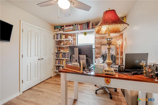 home office with ceiling fan, wood finished floors, and baseboards