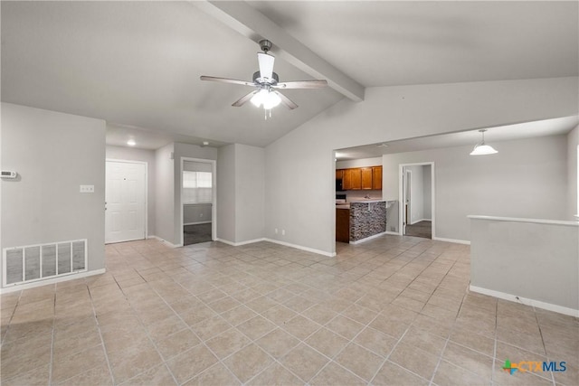 spare room with baseboards, vaulted ceiling with beams, visible vents, and a ceiling fan