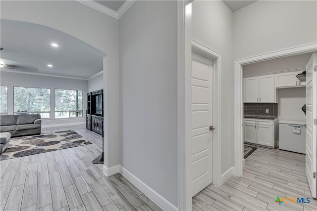 3935 Outpost Trce, Lago Vista, TX 78645 - corridor with crown molding, wood tiled floors, baseboards, and recessed lighting