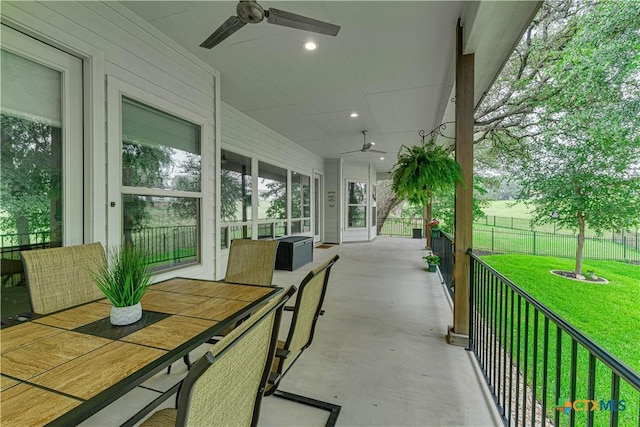 3935 Outpost Trce, Lago Vista, TX 78645 - view of patio / terrace featuring a ceiling fan and outdoor dining space