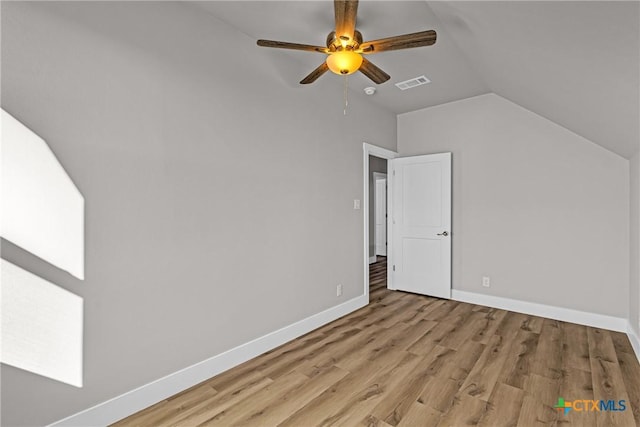 bonus room featuring ceiling fan, lofted ceiling, and light wood-type flooring