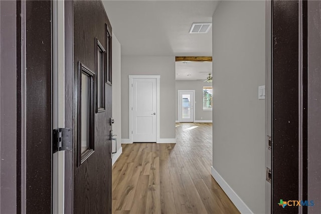 hallway featuring light hardwood / wood-style floors