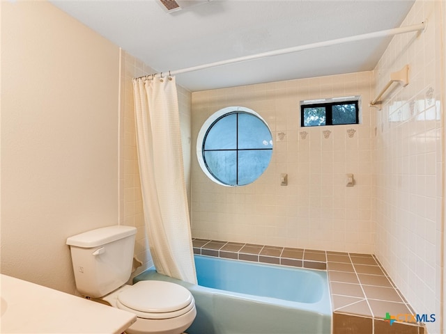 full bathroom with toilet, vanity, and shower / bathtub combination with curtain