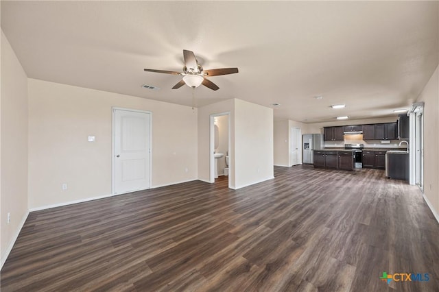 2007 Jefferson Ct, Belton, TX 76513 - unfurnished living room featuring a ceiling fan and dark wood finished floors