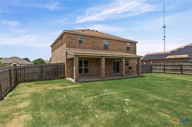 2007 Jefferson Ct, Belton, TX 76513 - rear view of house featuring brick siding, a fenced backyard, and a patio area