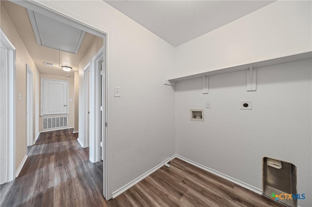2007 Jefferson Ct, Belton, TX 76513 - washroom featuring attic access, dark wood-style flooring, hookup for a washing machine, and electric dryer hookup