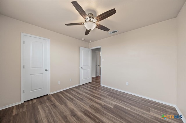 2007 Jefferson Ct, Belton, TX 76513 - unfurnished bedroom featuring dark wood-style flooring and a ceiling fan