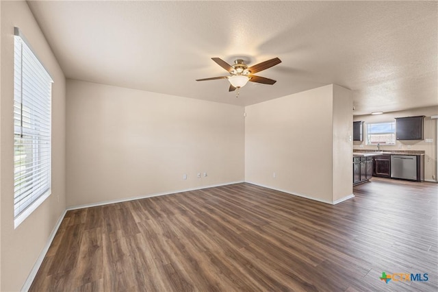 2007 Jefferson Ct, Belton, TX 76513 - unfurnished living room featuring dark wood-style flooring and ceiling fan