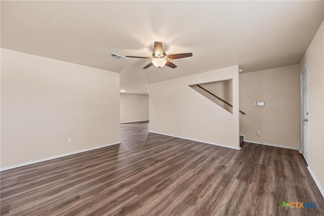 2007 Jefferson Ct, Belton, TX 76513 - unfurnished living room with ceiling fan, dark wood-type flooring, and stairway