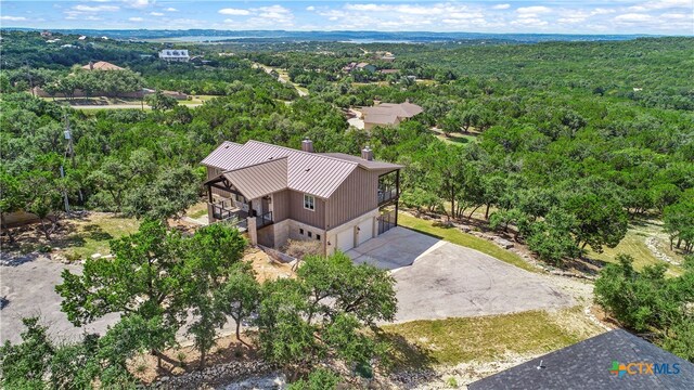 bird's eye view with a forest view