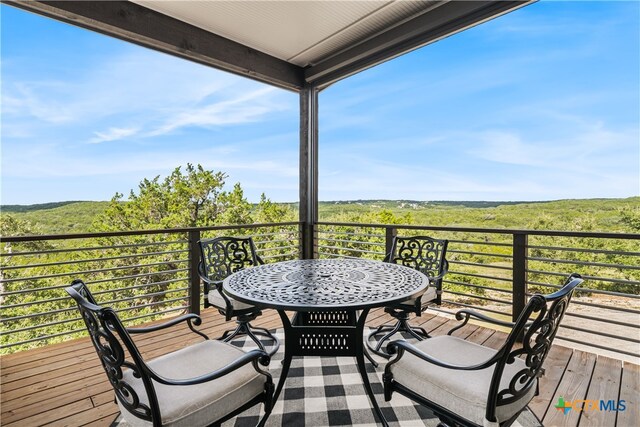 deck with a forest view