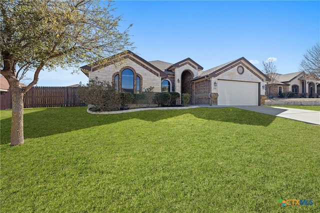 ranch-style home featuring a garage and a front lawn