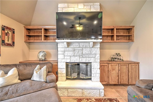 4813 Sapphire Dr, Killeen, TX 76542 - living area featuring vaulted ceiling, light tile patterned flooring, ceiling fan, and a fireplace