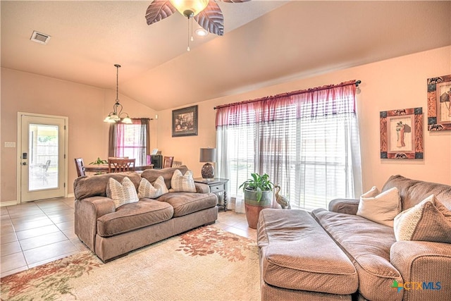 4813 Sapphire Dr, Killeen, TX 76542 - living area with light tile patterned floors, healthy amount of natural light, a chandelier, lofted ceiling, and ceiling fan