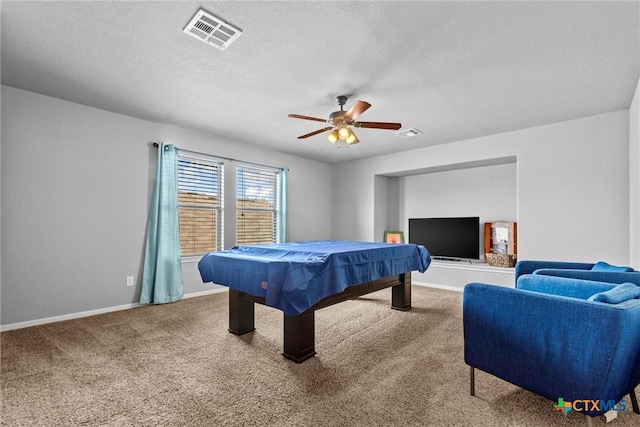 rec room featuring ceiling fan, carpet floors, a textured ceiling, and billiards