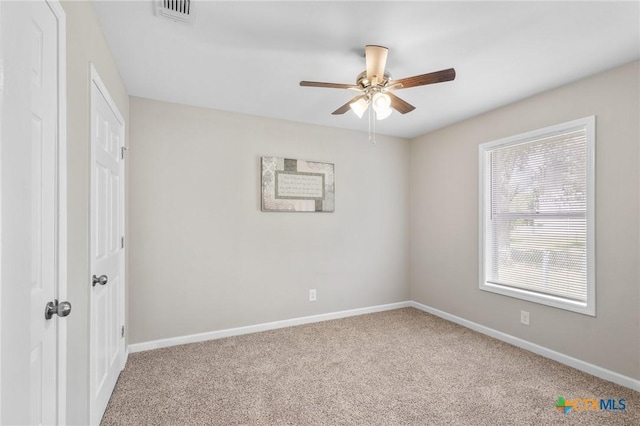103 Aberdeen St, Victoria, TX 77904 - unfurnished bedroom with carpet flooring, baseboards, and ceiling fan