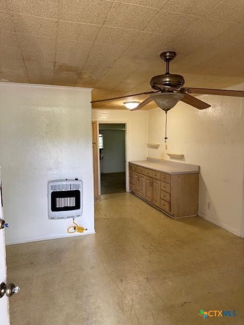 3205 Meadowlane St, Victoria, TX 77901 - unfurnished living room with heating unit and a ceiling fan