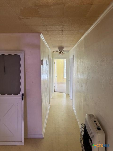 3205 Meadowlane St, Victoria, TX 77901 - hallway featuring light floors and crown molding