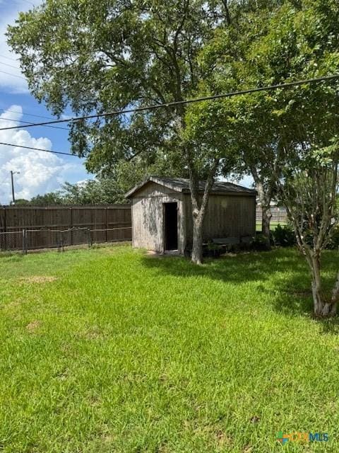 3205 Meadowlane St, Victoria, TX 77901 - view of yard featuring a storage unit