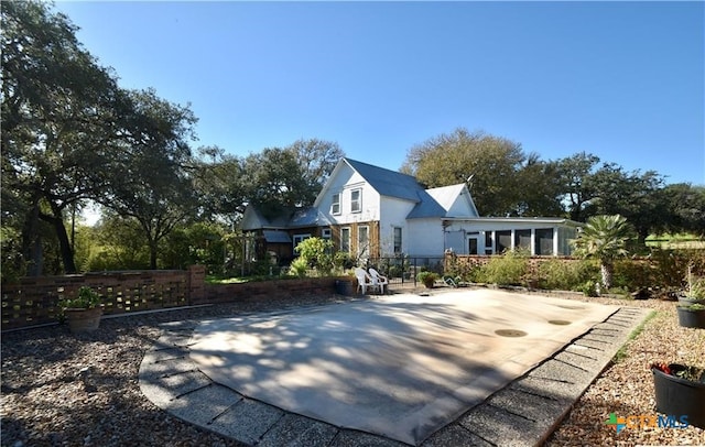 view of front of property with a patio