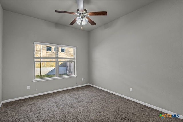 carpeted empty room with ceiling fan