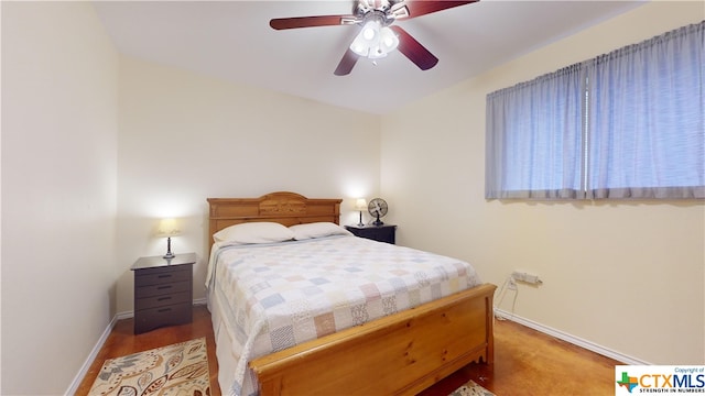 bedroom featuring ceiling fan and hardwood / wood-style flooring