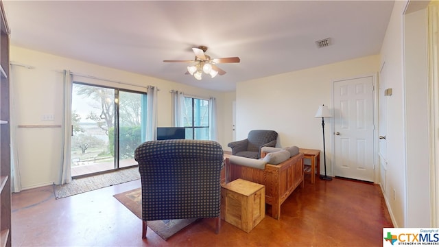 living room with ceiling fan