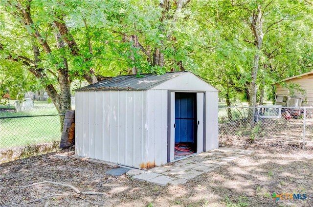 907 Curry Ave, Copperas Cove, TX 76522 - view of shed featuring a fenced backyard