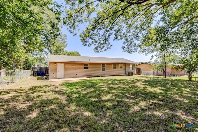 907 Curry Ave, Copperas Cove, TX 76522 - back of property with a patio and central AC unit
