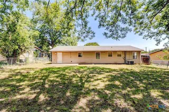 907 Curry Ave, Copperas Cove, TX 76522 - back of property featuring a patio and cooling unit