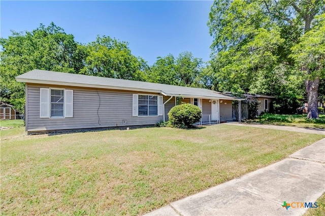907 Curry Ave, Copperas Cove, TX 76522 - ranch-style house with a front yard, a porch, and driveway