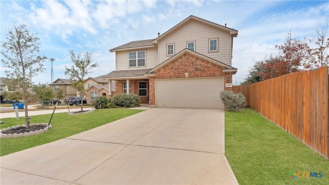 view of front of house with a front lawn and a garage