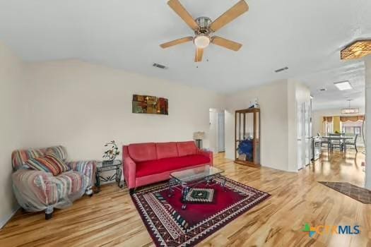 2303 Schwald Rd, Killeen, TX 76543 - living area with wood finished floors and a ceiling fan