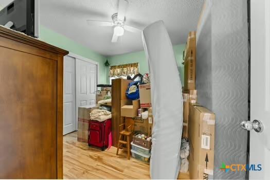 2303 Schwald Rd, Killeen, TX 76543 - bedroom featuring light wood-style flooring and a ceiling fan