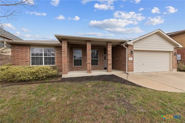 103 Lone Shadow Dr, Harker Heights, TX 76548 - ranch-style home featuring brick siding, a garage, concrete driveway, a front lawn, and covered porch