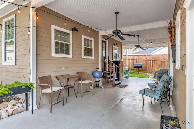 406 S Liberty St, Victoria, TX 77901 - view of patio featuring ceiling fan, fence, and a grill