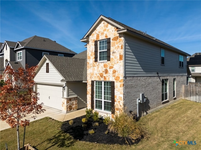 5712 Red Fish Ct, Belton, TX 76513 - view of property exterior with stone siding, a garage, driveway, and a shingled roof