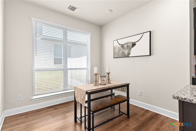 5712 Red Fish Ct, Belton, TX 76513 - dining space featuring dark wood-style flooring and baseboards