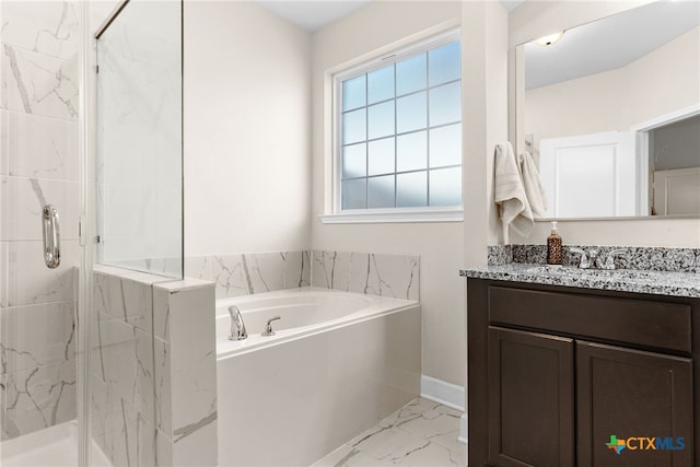 5712 Red Fish Ct, Belton, TX 76513 - bathroom with marble look tiles, a marble finish shower, a bath, vanity, and baseboards