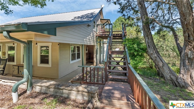 rear view of property with a deck