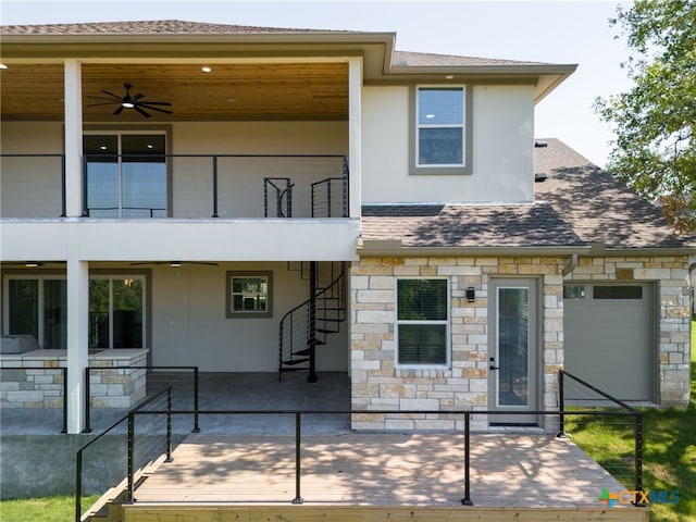 exterior space featuring a balcony and ceiling fan