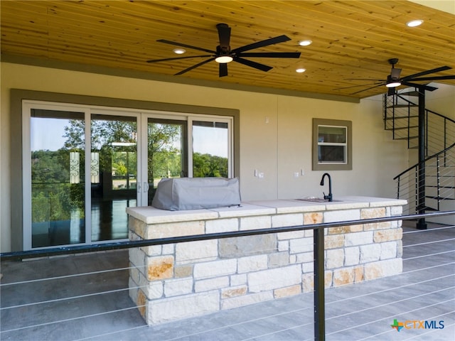 view of patio / terrace with sink and a grill