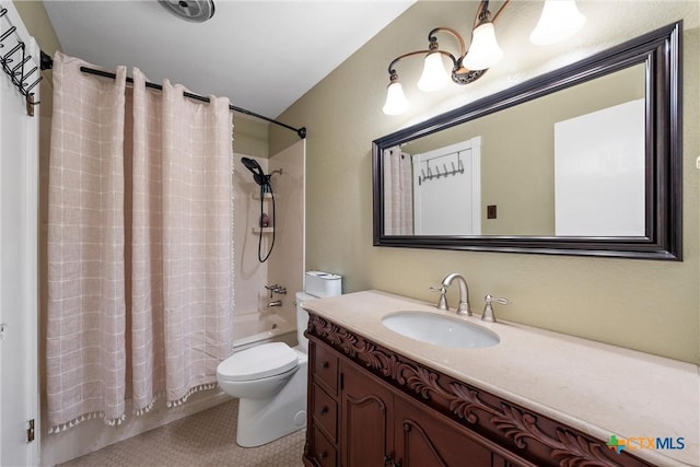 full bathroom featuring toilet, vanity, and shower / bathtub combination with curtain