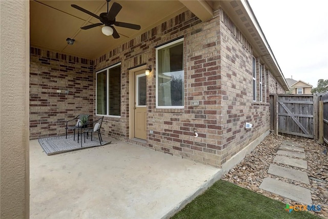 view of patio / terrace featuring ceiling fan